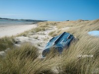 lifestyle image blue boat on beach